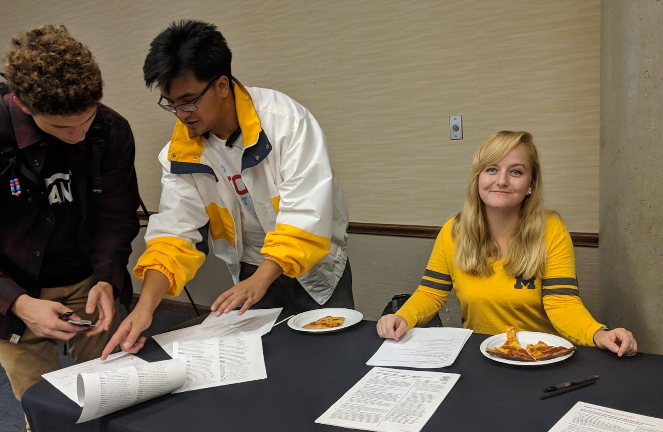 CEEP Fellows Joshua Cambri and Holly Armstrong registering students at the University of Michigan - Flint.
